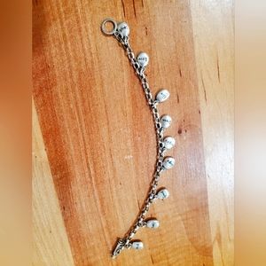 Silver charm bracelet with inspiring words